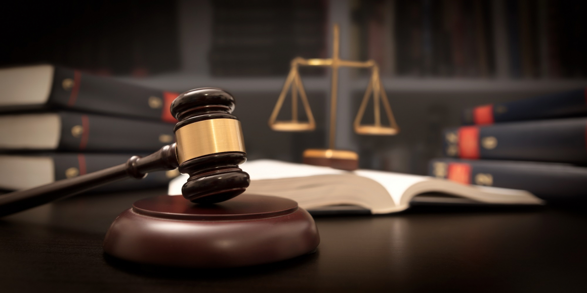 Gavel and Scales of Justice on Desk
