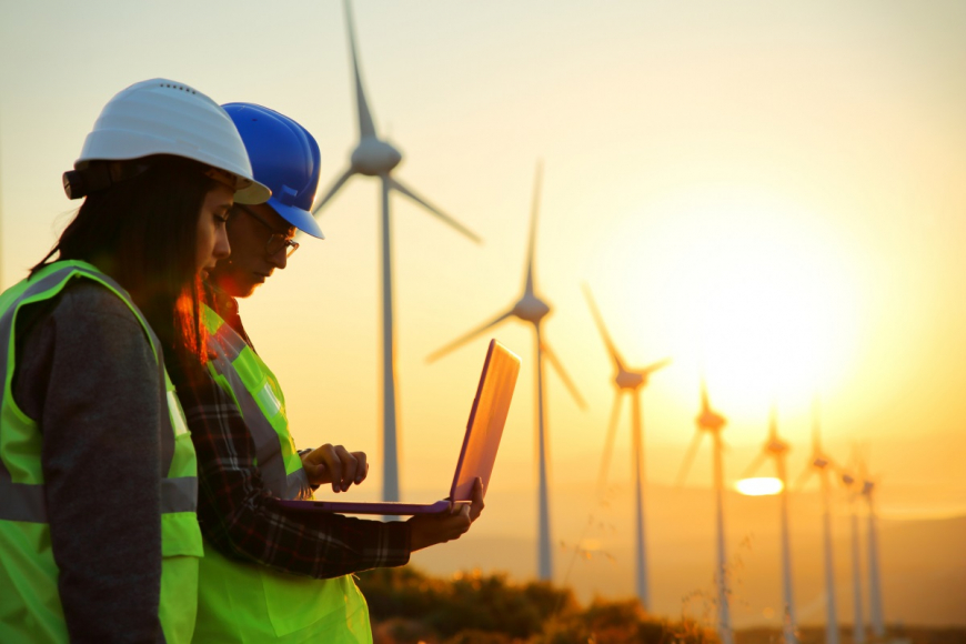 windmill engineers working on laptop 