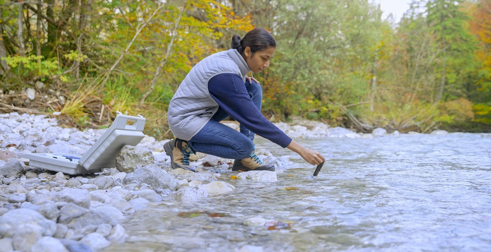 Scientist taking a water sample