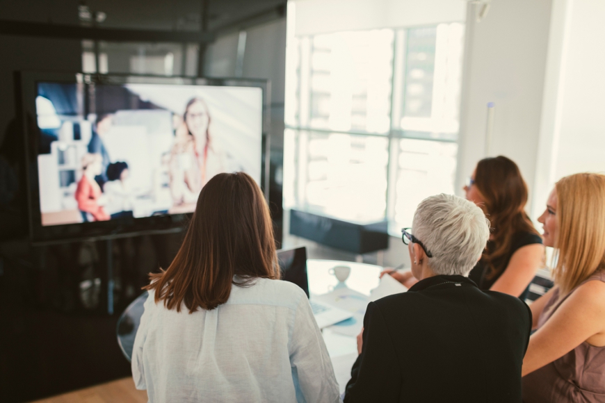 Employees watching webinar