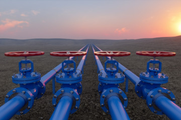 Oil and gas pipelines at sunset