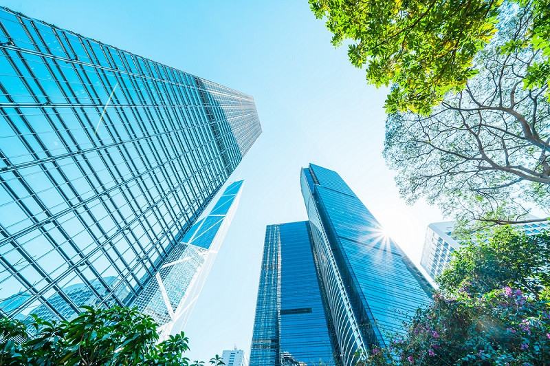 Looking up at skyscrapers