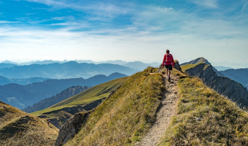 Man on top of a mountain
