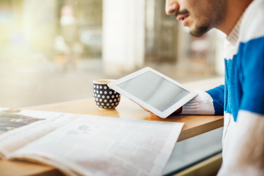 man reading newspaper