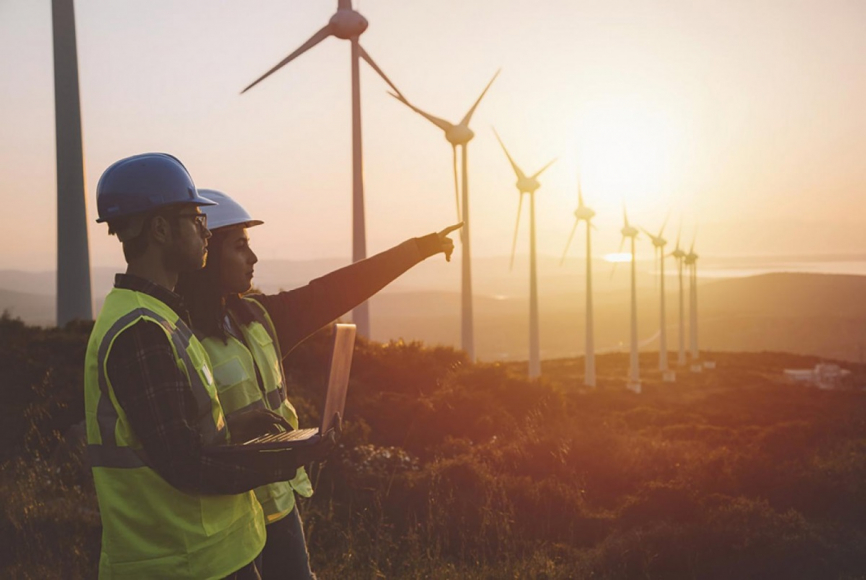Engineers working on windmills