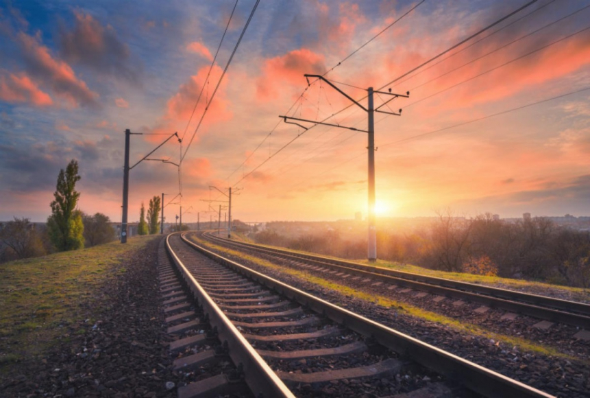 train tracks and a sunset 