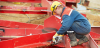 man welding metal 